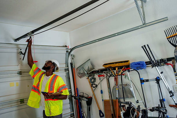 Professional Garage Door Panel Replacement technician working in Russells Point, OH